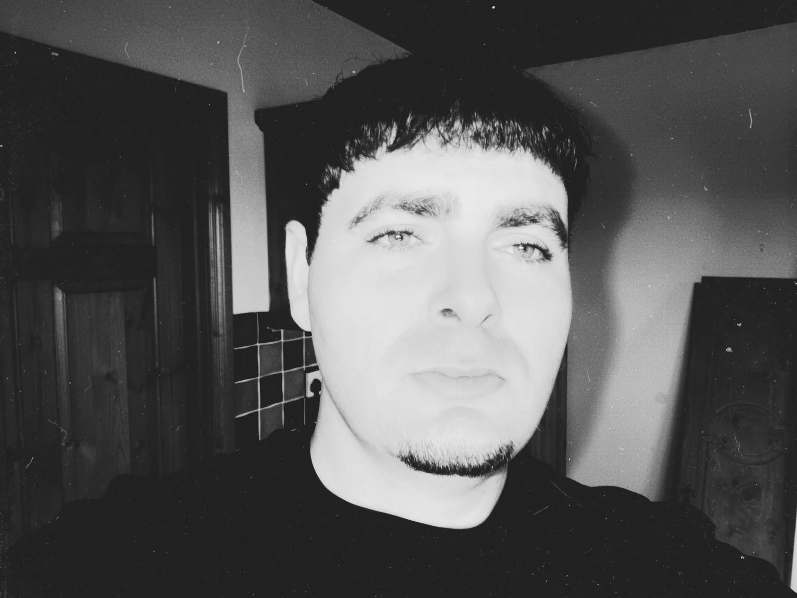 Close black-and-white portrait of Max Gotham
